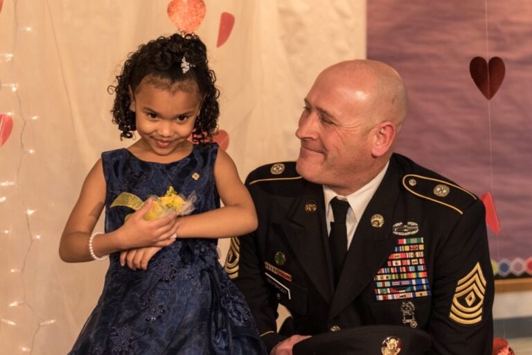 Soldier steps up to take little girl to daddy-daughter dance after she loses her father – and it is emotional
