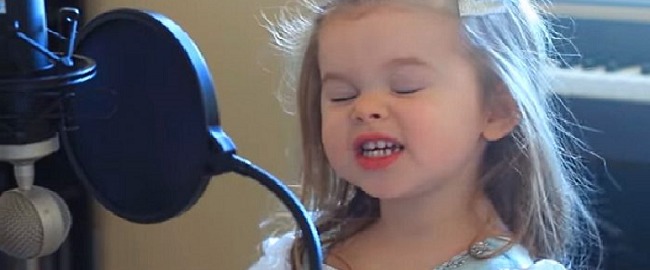 A 3-year-old girl sings in a way that steals all of our hearts. There are no words to convey emotion!