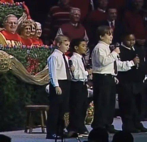 Four boys singing in church is the funniest thing I’ve seen. Keep your eyes on the boy in the vest