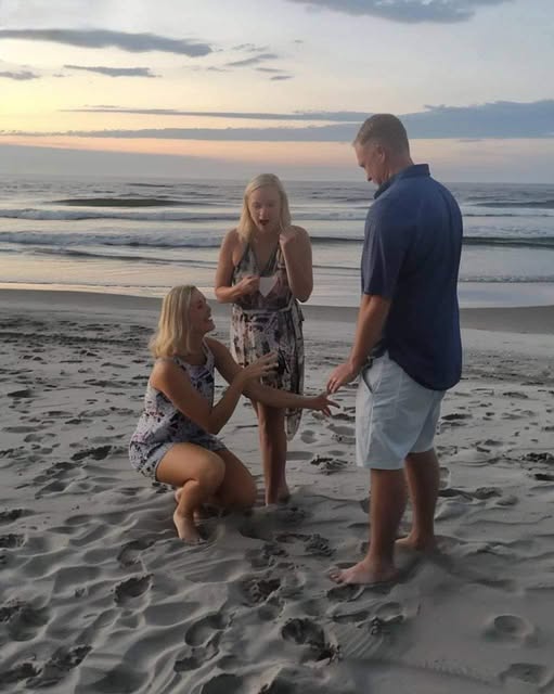 A woman knelt before my husband on the beach, calling his name—The truth left me speechless.